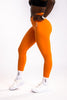 Leggings ContourBoost de color naranja brillante
